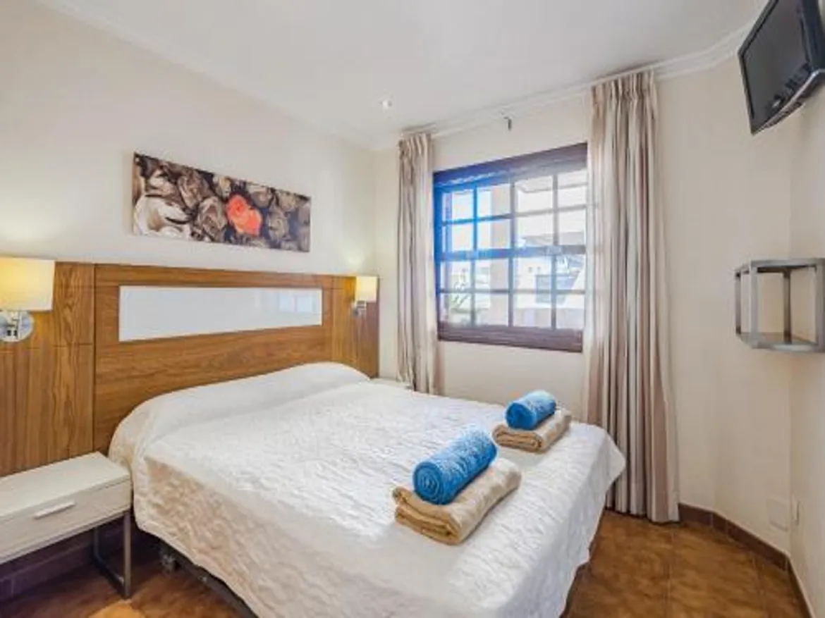 Cozy hotel room with king-sized bed