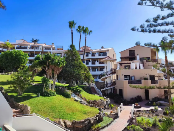 Resort with gardens under clear blue sky