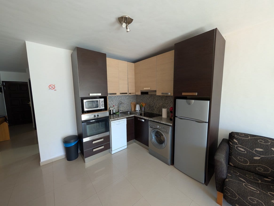 cosina optimized Modern kitchen with appliances and cabinets.